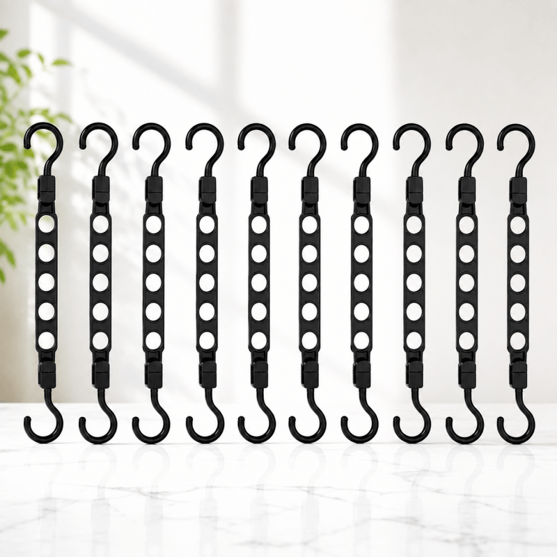 Ten black cascading wardrobe hanger organisers
